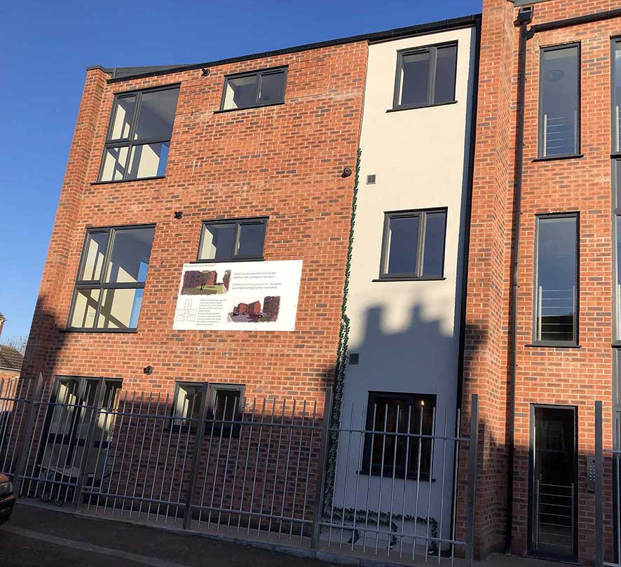 dark framed windows in flats