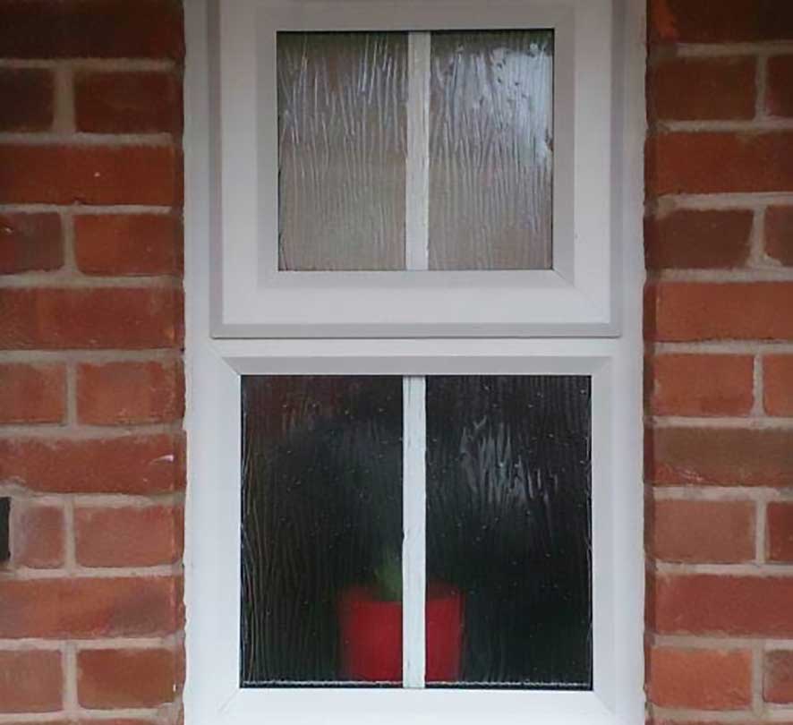 white window with obscure glass