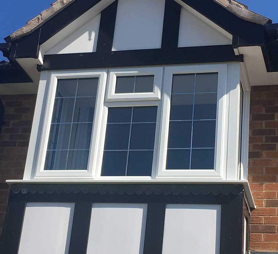 white framed windows with retro style house